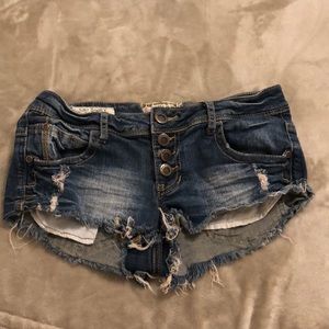 Distressed denim shorts
